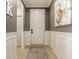 Inviting entryway with gray walls, white wainscoting, a decorative rug, and modern artwork at 2548 Ruffian Dr, Westfield, IN 46074
