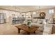 Open concept living space with a kitchen island, living room seating, and stylish decor at 2548 Ruffian Dr, Westfield, IN 46074