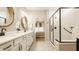 Bright main bathroom with double vanity, quartz countertop, and modern tiled shower at 2548 Ruffian Dr, Westfield, IN 46074