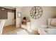 Stylized home office decor featuring a large clock and elegant furnishings at 2548 Ruffian Dr, Westfield, IN 46074