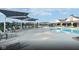 Well-appointed community pool featuring lounge chairs, sun shades, and pristine waters at 2548 Ruffian Dr, Westfield, IN 46074