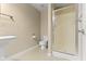 Compact bathroom with stand-up shower, tile flooring, and modern fixtures at 300 Wyndotte Dr, Carmel, IN 46032