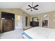 Main bedroom boasts a ceiling fan, a closet, and an ensuite bathroom entrance at 300 Wyndotte Dr, Carmel, IN 46032