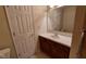 This bathroom has neutral walls, vanity with sink, and wood cabinets at 3237 Boxwood Dr, Indianapolis, IN 46227