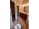 Bathroom with large double vanity, soaking tub and access to toilet room and closet at 3237 Boxwood Dr, Indianapolis, IN 46227