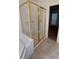 En suite bathroom with glass enclosed shower and gold trim at 3237 Boxwood Dr, Indianapolis, IN 46227
