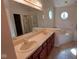 Bright bathroom featuring a double vanity and a separate shower and tub at 3237 Boxwood Dr, Indianapolis, IN 46227