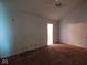 This bedroom showcases a ceiling fan, neutral walls, and plush carpeting at 3237 Boxwood Dr, Indianapolis, IN 46227