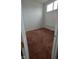 This bedroom offers bright windows, neutral walls, and plush carpeting at 3237 Boxwood Dr, Indianapolis, IN 46227