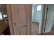 View into a bedroom area showcasing neutral walls and plush carpeting at 3237 Boxwood Dr, Indianapolis, IN 46227