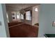 Bright dining room with mirrored wall and a view of the front entrance at 3237 Boxwood Dr, Indianapolis, IN 46227