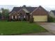 Charming single-Gathering home featuring a well-manicured lawn and inviting front yard at 3237 Boxwood Dr, Indianapolis, IN 46227