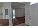 Bright foyer showcasing a chandelier-lit dining room and access to other living areas at 3237 Boxwood Dr, Indianapolis, IN 46227