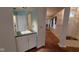 Hallway with bar sink and view to front entrance and dining room at 3237 Boxwood Dr, Indianapolis, IN 46227