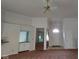 Bright open concept living room with ceiling fan at 3237 Boxwood Dr, Indianapolis, IN 46227