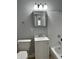 Bathroom with a white vanity, toilet, and shower at 3841 Monica Ct, Indianapolis, IN 46226
