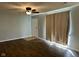 Living room with hardwood floors, neutral walls, and a ceiling fan at 3841 Monica Ct, Indianapolis, IN 46226