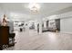 Expansive open-concept living area showcasing modern design with connecting kitchen and living spaces at 415 Elm Ave, Sheridan, IN 46069