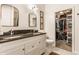 Bathroom with double sinks, granite countertops, walk-in closet, and modern fixtures create a spa-like atmosphere at 420 Orange St, Indianapolis, IN 46225