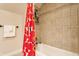 Bathroom area with a shower/tub and vibrant shower curtain at 420 Orange St, Indianapolis, IN 46225