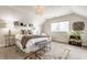 Bright bedroom featuring a comfortable bed, stylish decor, and natural light from a large window at 420 Orange St, Indianapolis, IN 46225