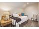 Comfortable bedroom with soft chair, stylish decor and natural light at 420 Orange St, Indianapolis, IN 46225