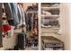 Well-organized walk-in closet with shelving, hanging rods, and storage drawers is perfect for storage at 420 Orange St, Indianapolis, IN 46225