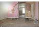 Bedroom with unfinished walls and floors at 425 N Grant Ave, Indianapolis, IN 46201