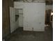 Interior showcasing a room's deteriorated condition, peeling paint, exposed lath, and visible water damage on the walls at 425 N Grant Ave, Indianapolis, IN 46201