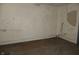Image showing a room needing repair, walls with peeling paint and bare spots, reflects a renovation project at 425 N Grant Ave, Indianapolis, IN 46201