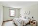 Bright bedroom with a queen bed, complemented by matching nightstands and decor, creating a serene atmosphere at 4337 Lincoln Rd, Indianapolis, IN 46228