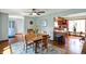 Open dining area offers natural light, hardwood floors, and easy access to the kitchen at 4337 Lincoln Rd, Indianapolis, IN 46228