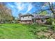 Well-maintained, single-Gathering home with brick and shingle siding and a large front lawn at 4337 Lincoln Rd, Indianapolis, IN 46228