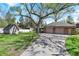 Detached two-car garage with ample parking space and additional shed for storage at 4337 Lincoln Rd, Indianapolis, IN 46228