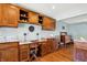 Kitchen desk area features custom cabinetry, granite countertops, and a dedicated workspace at 4337 Lincoln Rd, Indianapolis, IN 46228