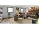 Relaxing living room with large sectional sofa and natural lighting, ideal for entertaining and relaxation at 4337 Lincoln Rd, Indianapolis, IN 46228