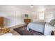 Bright bedroom featuring a hardwood floor, and minimalist decor at 4343 N Pennsylvania St, Indianapolis, IN 46205