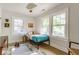 Bedroom featuring natural light, hardwood floors, and a playful decor at 4343 N Pennsylvania St, Indianapolis, IN 46205