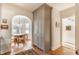 Eating area with gray cabinets, brick floors and a view into another room at 4343 N Pennsylvania St, Indianapolis, IN 46205