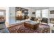 Bright living room features a fireplace, stylish furniture, and unique shelving at 4343 N Pennsylvania St, Indianapolis, IN 46205