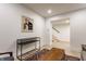 Modern living room showcasing a decorative console table and vibrant, geometric-patterned rug at 4343 N Pennsylvania St, Indianapolis, IN 46205