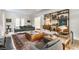 Spacious living room featuring stylish furniture, a fireplace, and plenty of natural light at 4343 N Pennsylvania St, Indianapolis, IN 46205