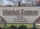 Whitehall Commons community sign conveys a private neighborhood with no soliciting or trespassing allowed at 4412 Mountbatten Ct, Indianapolis, IN 46254