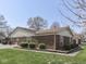 Lovely home featuring manicured landscaping, a brick exterior and attached garages at 4412 Mountbatten Ct, Indianapolis, IN 46254
