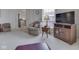Bright and airy living room with comfortable seating and media center at 4412 Mountbatten Ct, Indianapolis, IN 46254