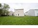 A spacious backyard featuring a lawn with wildflowers at 4545 Connaught East Dr, Plainfield, IN 46168