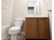 Bathroom featuring a vanity, toilet, and a bathtub with tiled walls at 4545 Connaught East Dr, Plainfield, IN 46168