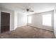 Bedroom featuring neutral paint, plush carpeting, ceiling fan, and lots of natural light at 4545 Connaught East Dr, Plainfield, IN 46168