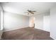 Spacious bedroom featuring neutral paint, plush carpeting, and a ceiling fan at 4545 Connaught East Dr, Plainfield, IN 46168