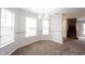 Open dining room with updated flooring and trimwork, perfect for entertaining or Gathering meals at 4545 Connaught East Dr, Plainfield, IN 46168